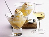 Pear compote with ice cream and slivered almonds