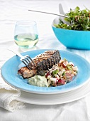 Grilled salmon with vegetable salad and feta cheese