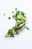 Veal tongue with stockfish salad and peas