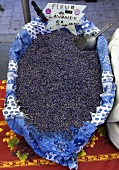Lavender flowers in a basket at the market in Vaison-La-Romaine, Provence