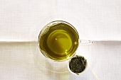 Mulberry tea in a glass cup, seen from above