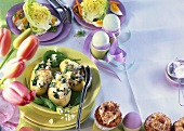 Muffins, potatoes stuffed with spinach & lettuce hearts with egg