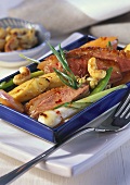 Roast duck breast with vegetables and cashew nuts