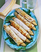 White asparagus spears with walnuts in yufka pastry