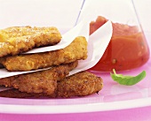 Panierte Schnitzelchen mit Tomatensauce