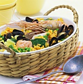 Paella with fish fillet, mussels, prawns and vegetables