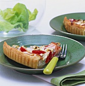 Fish quiche with cocktail tomatoes and ricotta