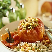 Stuffed red pepper with mince filling on rice