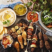 Barbecued food, salad and dips