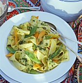 Ribbon pasta with vegetables and parsley pesto