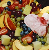 Fruit salad and mascarpone cream with raspberries (detail)