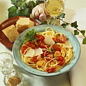 Spaghetti with garlic, cherry tomatoes and Parmesan