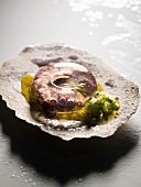 Octopus in aspic ring with herb sauce
