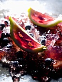 Wedge of lime filled with berries in aspic