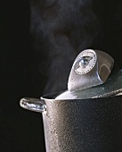 Pan of boiling water and timer (11 minutes)