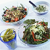 Sauerkraut & spinach salad and bulgur & lentil salad on buffet