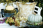 Garden seat with autumn decorations (hydrangeas etc.)
