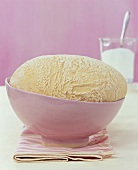 Risen yeast dough in a bowl