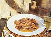 Veal tongue with tomatoes and walnuts