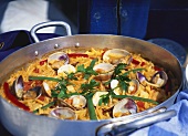 Cazuela de fideua (Pan-cooked pasta dish with seafood, Spain)