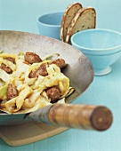 Stir-fried sausage and cabbage dish