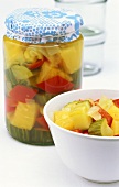 Bottled pineapple, cucumber and peppers