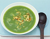 Broccoli cream soup with toasted pine nuts