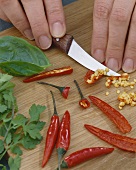 Deseeding chillies with a knife