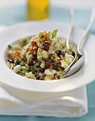 Couscous salad with vegetables, feta, raisins & argan oil