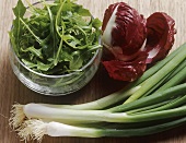 Spring onions, radicchio and a bowl of rocket
