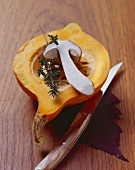 Autumn still life: Hokkaido squash with cep and thyme