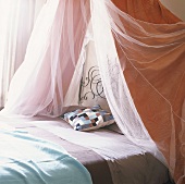 A bed with a canopy