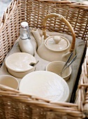 Coffee crockery in a picnic basket