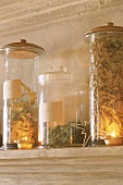 Storage jars by candle light