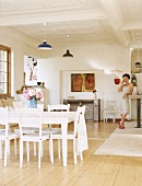 Woman talking on telephone in kitchen