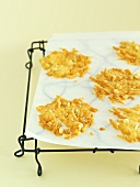 Parmesan and nut wafers on baking parchment