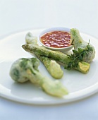 Asparagus and broccoli tempura with sweet and sour sauce