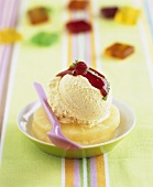 Vanilla ice cream with strawberry puree on pineapple rings