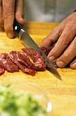 Beef fillet being sliced