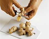 Peeling ginger roots