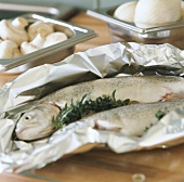 Trout with herbs in aluminium foil
