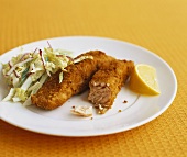 Salmon fish fingers with cabbage salad (California, USA)