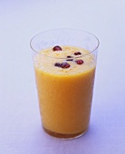 Mango & melon smoothie with rose water and pomegranate seeds