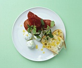 Herb yoghurt balls with bresaola and bread