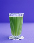 A glass of wheatgrass juice