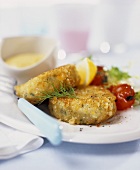 Fish cakes with salad and dip