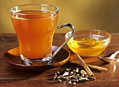 Winter drink of green tea, spices and honey