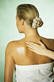 Woman having Bach Flower Essences rubbed into her back