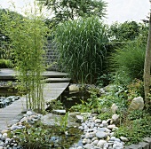 Garden with pond and footbridge