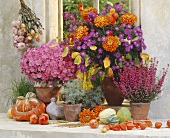 Still life with autumn flowers and squashes
